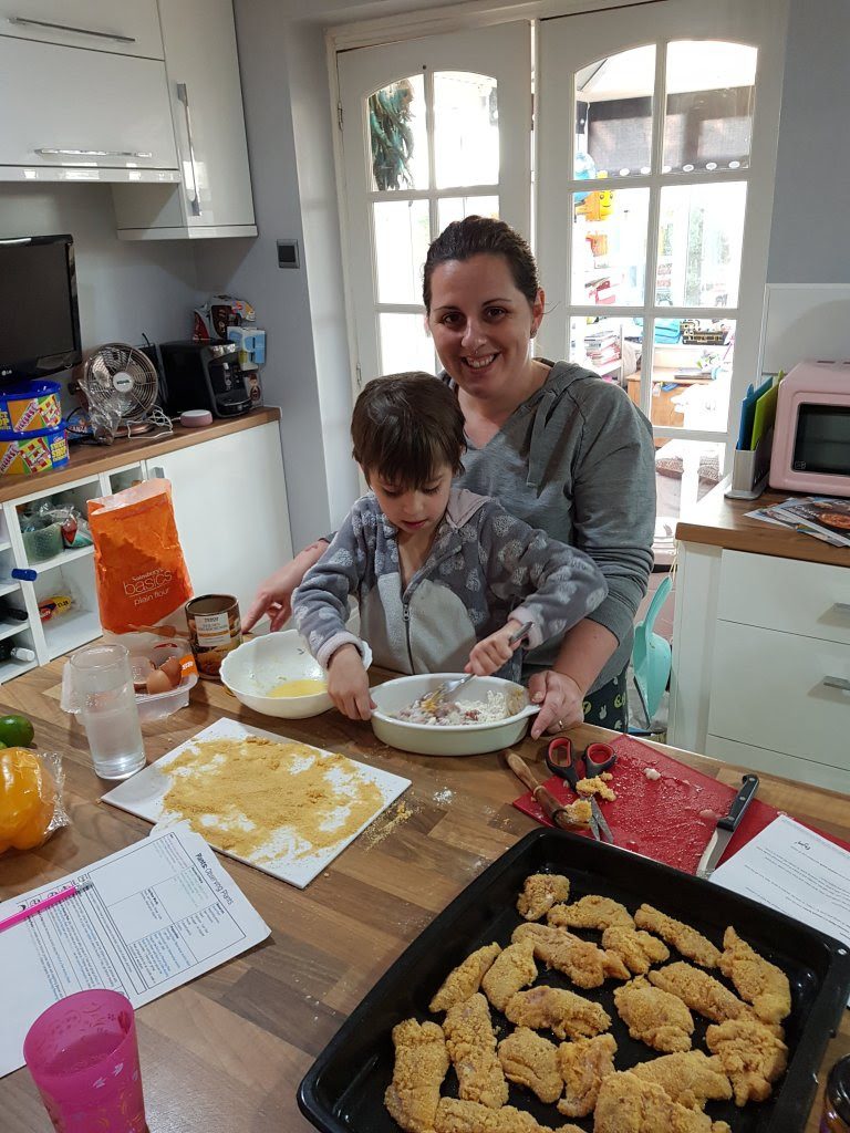 Kara cooking with son