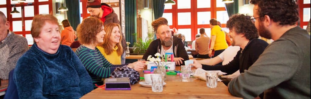 people at a Bristol Wellbeing College cafe event