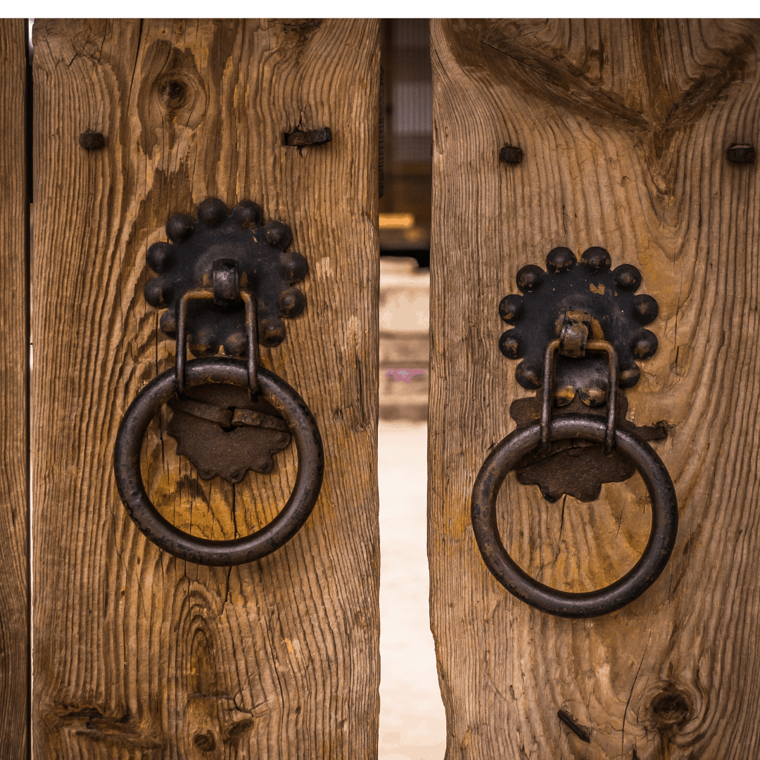 Heavy wooded gates with large handles