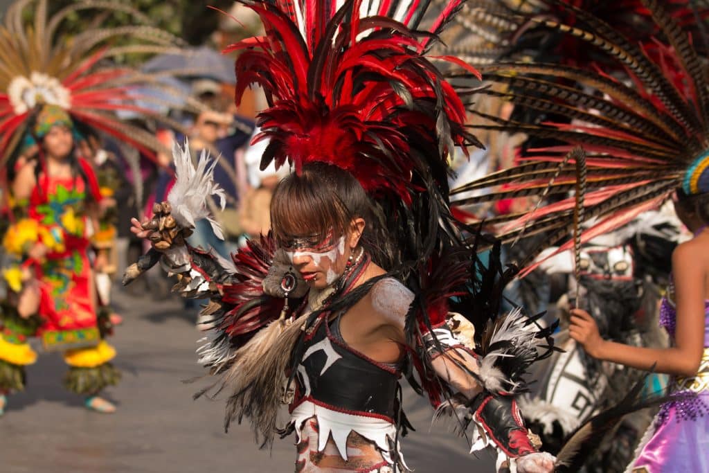 Woman dress in bright carnival outfit